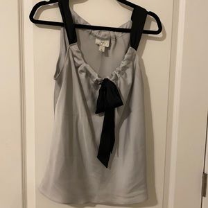 Silky gray sleeveless top with bow